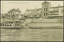 Trentemoult. - Le quai Jean Bart, les commerces, un roquio à l'embarcadère.