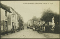 Le bourg. - Place de la Blanche avec la statue de Notre-Dame la Blanche et chemin menant vers les Couëts.